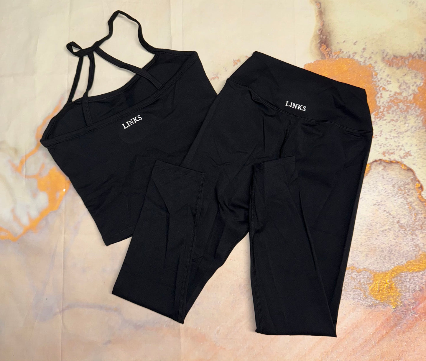 Black backless top and leggings co ord